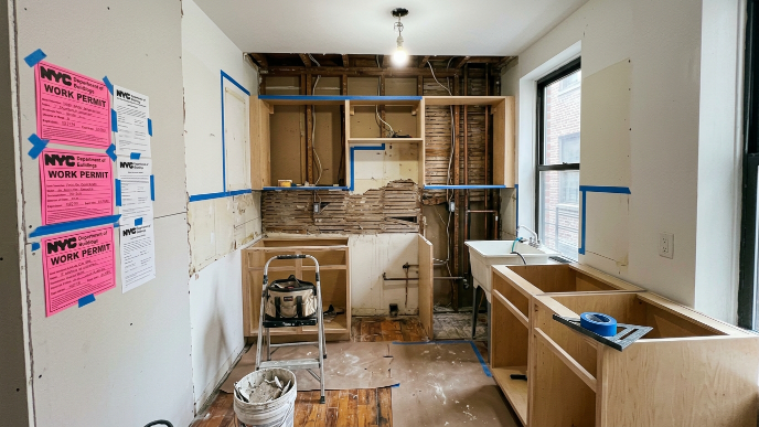 NYC kitchen renovation mistakes — exposed walls in Manhattan co-op apartment under renovation